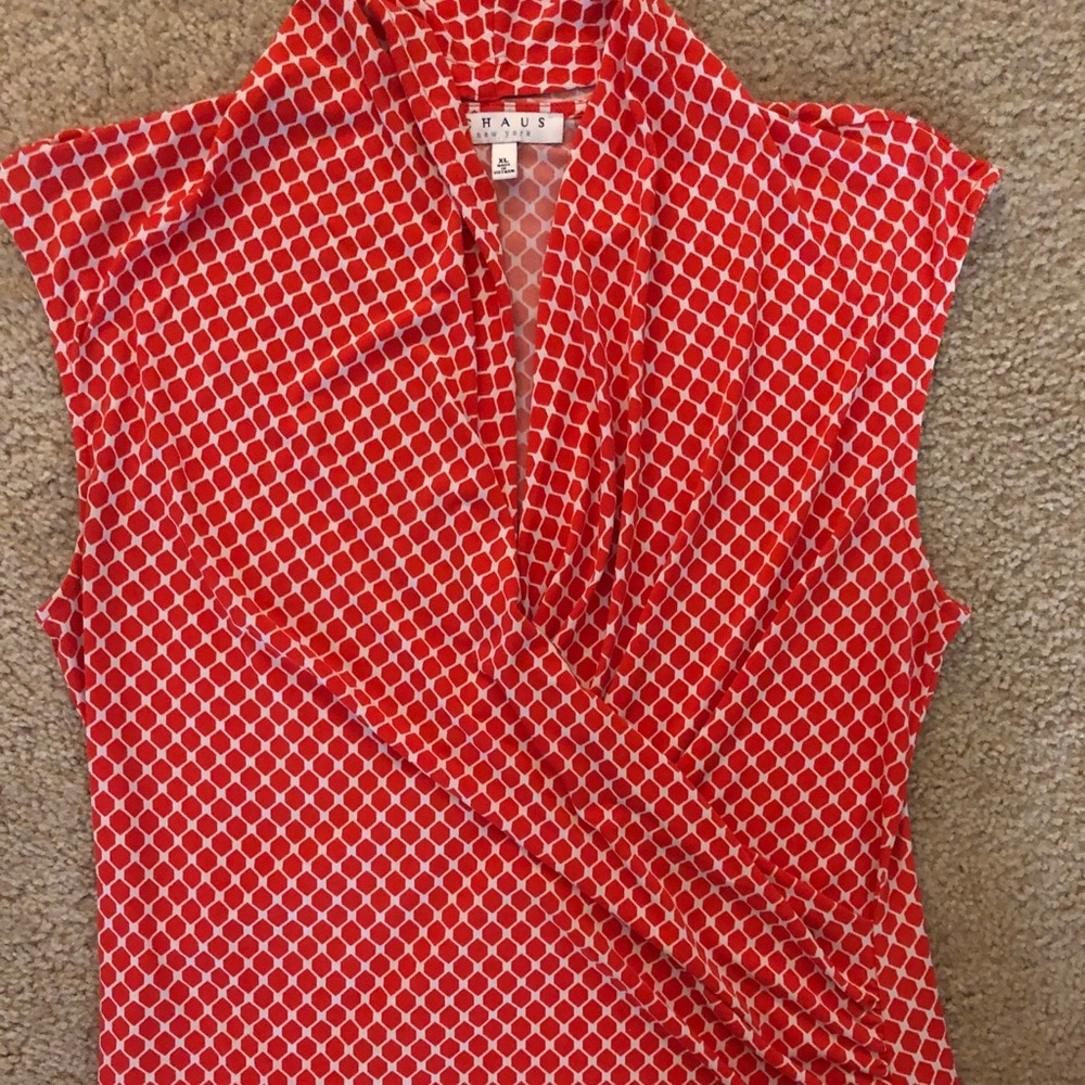 Lovely orange and white printed blouse